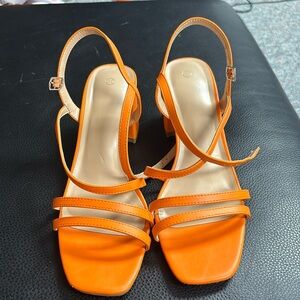 Women’s orange high heels